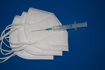 medical masks and vaccinations against covid-19