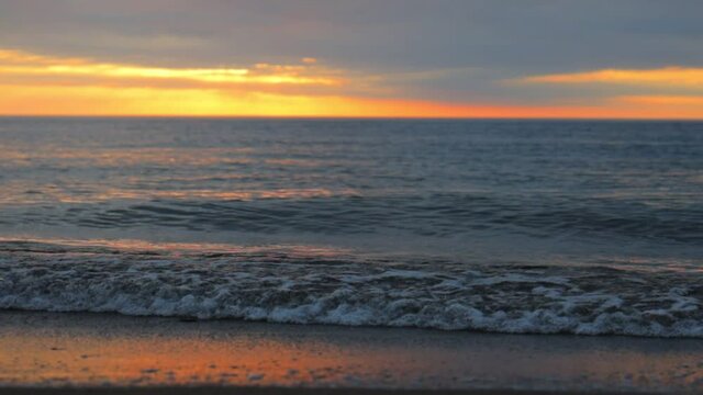 海と夕日　砂浜　スロー　2月　冬の日本海