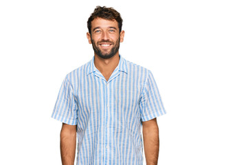 Fototapeta premium Handsome young man with beard wearing casual fresh shirt with a happy and cool smile on face. lucky person.