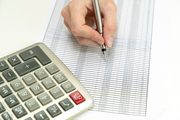 the schedule of loan payments and money with a calculator