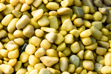 Collection Of Bright Lemon Yellow Or Mustard Colored Stones Of Various Shapes And Sizes Stacked. Mostly Used For Home Garden Backyard Fountain Decor And Aquarium. Suitable For Wallpaper Or Background