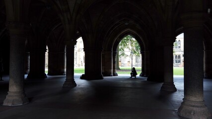 Fototapeta premium The Cloisters at Glasgow University looking out onto a quadrangle.