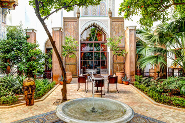 Grounds and interiors of the Riad Laaroussa in Fes Morocco.
