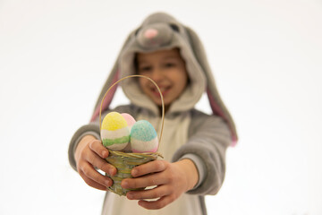 Girl in bunny costume keep the basket of Easter eggs. isolated on white. easter holiday concept. high quality