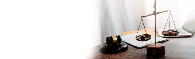 justice and law concept.Male judge in a courtroom on wooden table and Counselor or Male lawyer...