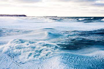 Frozen Baltic sea in the winter in storm 