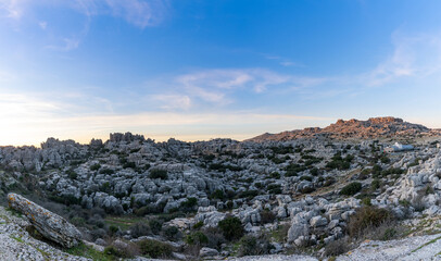 panorama view of the El Torcal Nature Reserve in Andalusia with ist strange karst rock formations at sunset