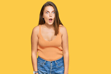 Young caucasian woman wearing casual clothes afraid and shocked with surprise expression, fear and excited face.