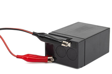 Acid rechargeable battery pack with wires connected to pins, isolated on white background