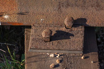 rusty metal plate on the railroad