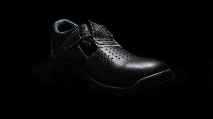 work shoes on a black background close up