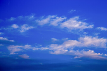 Naklejka na ściany i meble photo of bright blue sky with clouds