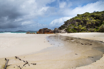 Fototapeta na wymiar Australian landscape with bush, ocean coastline and blue sky