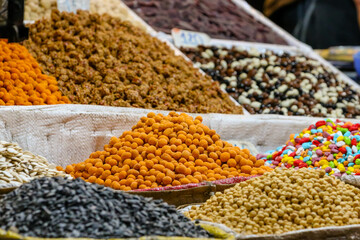 Nuts, dried fruits and spices in the souks of Marrakech in Morocco