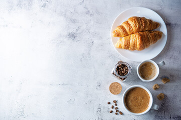 Cups of coffee on a white background