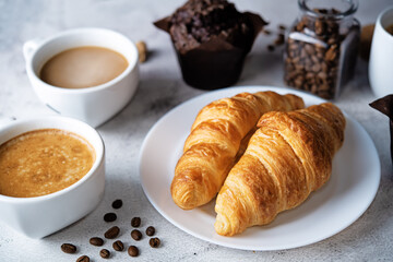 Cups of coffee on a white background