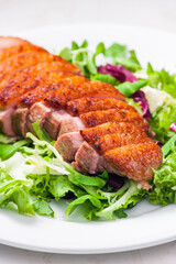 roasted duck breast with green salad