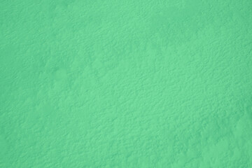 Abstract colored background. Colored green snow texture as background.