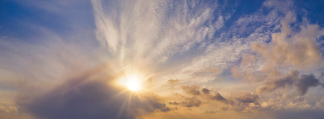 Winter sunset Skyscape - Stunning epic sunset sky with the setting sun on the horizon. 