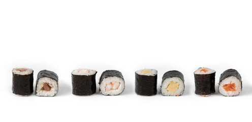 Four maki rolls in a row isolated on white background.