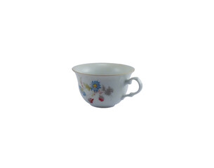 An old-fashioned and romantic teacup with floral motifs