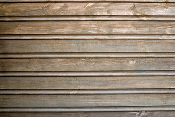 Fototapeta premium the wall is covered with clapboard. wooden background.