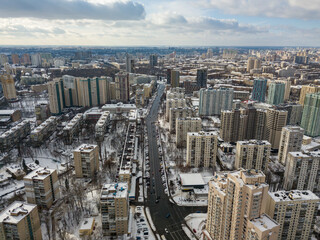 Fototapeta na wymiar Snowy Kiev. Aerial drone view. Winter sunny morning.