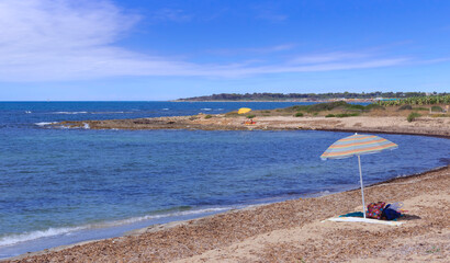 Salento coast: Lido Marini beach, almost sandy and embellished with low cliffs, easy to reach, stretches for more than two kilometres, in the area of the municipalities of Salve and Ugento in Apulia.