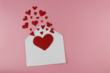 Open the envelope and heart-shaped paper. Valentine's Day Concepts