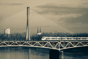 Fototapeta na wymiar Bridge over the river on which the train travels
