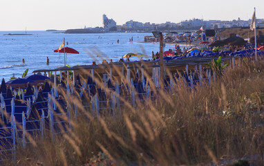 Summertime: sunshine beach. Torre San Giovanni Beach is one of the longest and most appealing among...