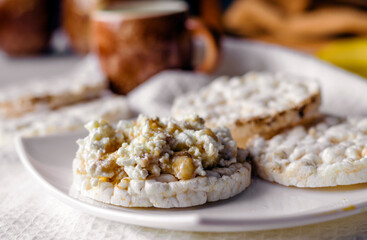 Sandwich with cottage cheese, honey and banana on a diet bread