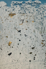 Golden reflections on old handmade paper