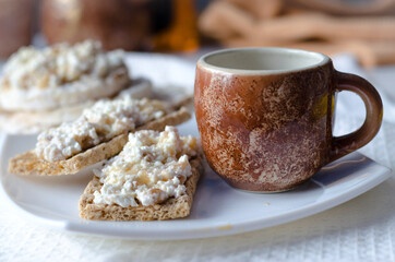 Sandwich with cottage cheese, honey and banana on a diet bread