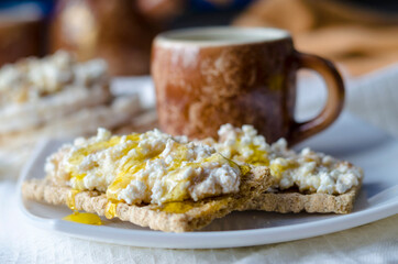 Sandwich with cottage cheese, honey and banana on a diet bread