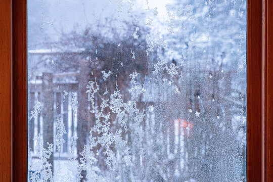 Looking Through A Frosted Window And Snowscape