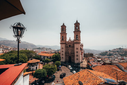 Church of Taxco, Guerrero, Mexico, seen from a building in front of it, of Baroque architecture. 