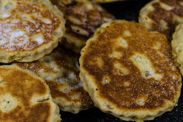 Close up of Freshly cooked sugared welshcakes.