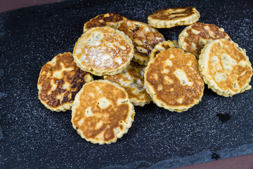 Freshly cooked sugared welshcakes, copyspace.
