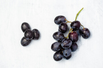 Fresh grapes on a light background - healthy living