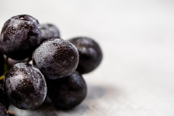 Fresh grapes on a light background - healthy living