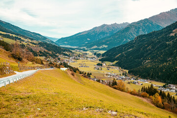 Naklejka premium A beautiful village in a mountain valley. Peaceful quiet