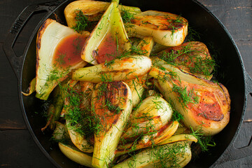 Sautéed Fennel with Garlic and Tomato Sauce: Sliced fennel bulbs in a tomato-garlic sauce