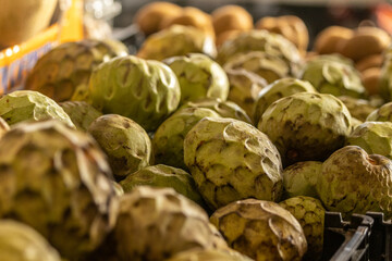 Obraz premium Anona, fruit for sale at farmers market, Azores islands.