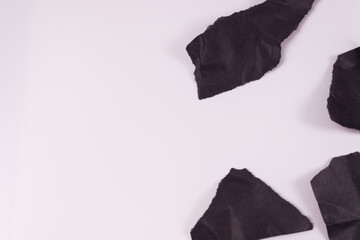 on the right side of the frame, four-fifths of a piece of black paper