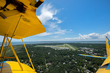 View of McKinnon Airport from a 1940 Waco UPF-7 Biplane over St Simons Island, Georgia © Guy Bryant