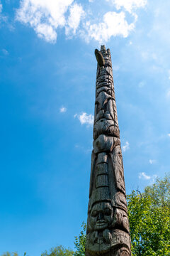 A totem pole stands tall on a beautiful sunny day in Thomson Memorial Park in Toronto (Scarborough), Ontario.