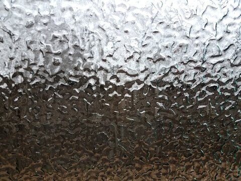 Freezing Rain Ice On Car Window Glass