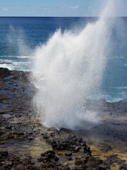waves crashing on rocks