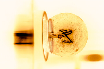 Lightbulb negative photography in color yellow